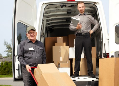 Removal truck and moving boxes for a house move in Blackwall