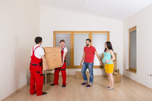 Packed office crates and furniture ready for relocation