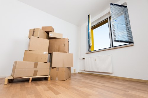 Manual handling safety measures during a careful furniture move