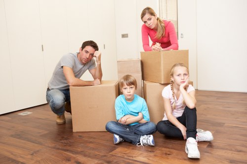 Professional movers loading furniture for a Blackwall move