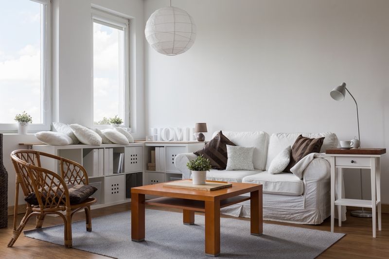 Unpacking household items in a Blackwall home